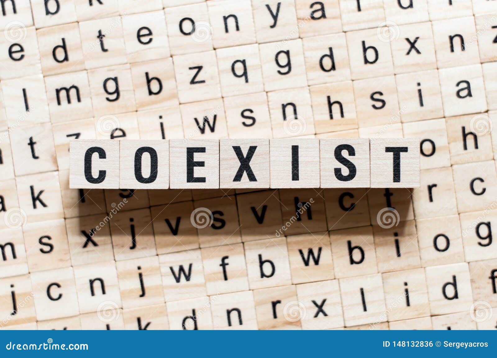coexist word concept on cubes