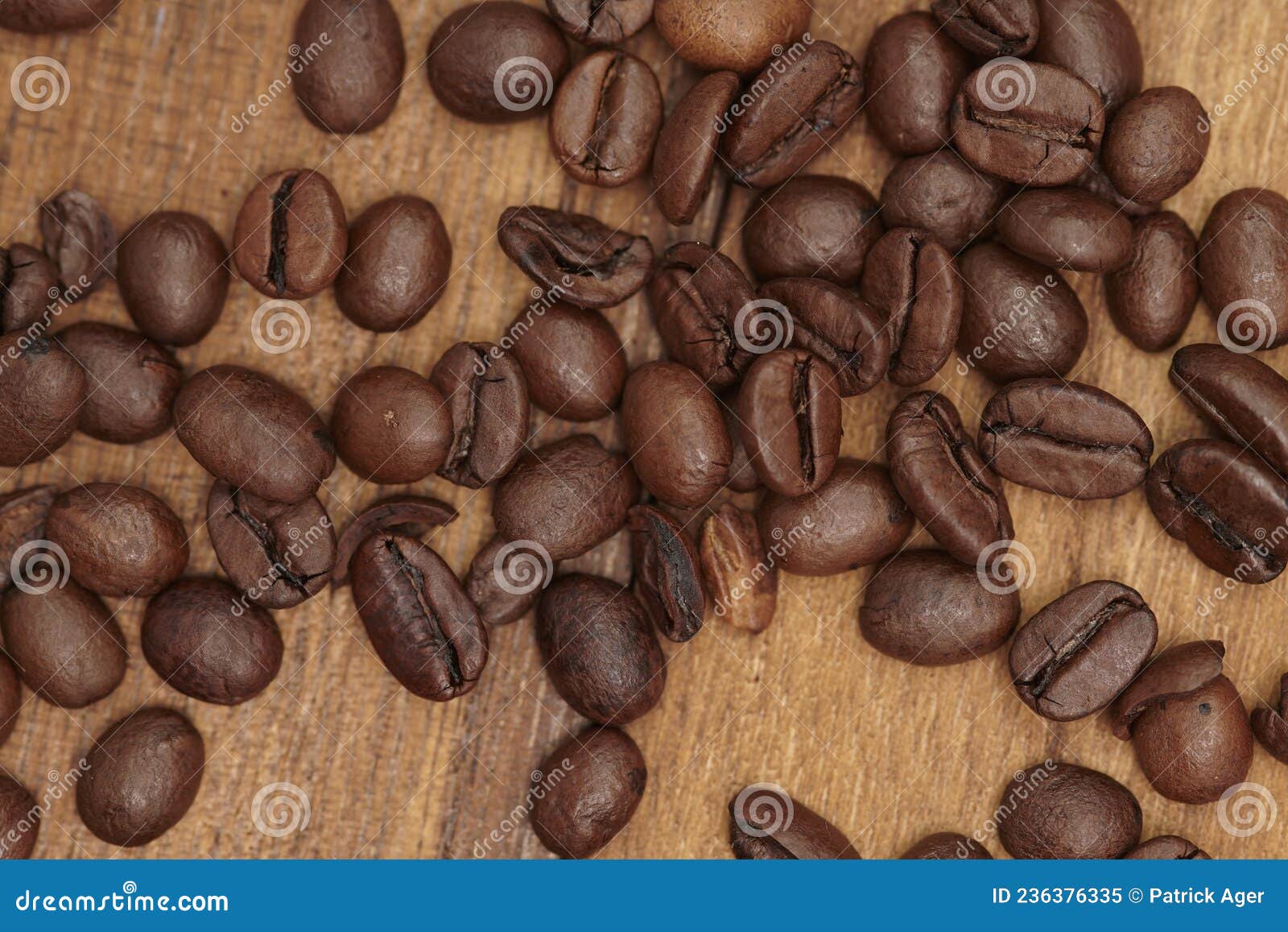 coffee beans on zebrano wood cutting board