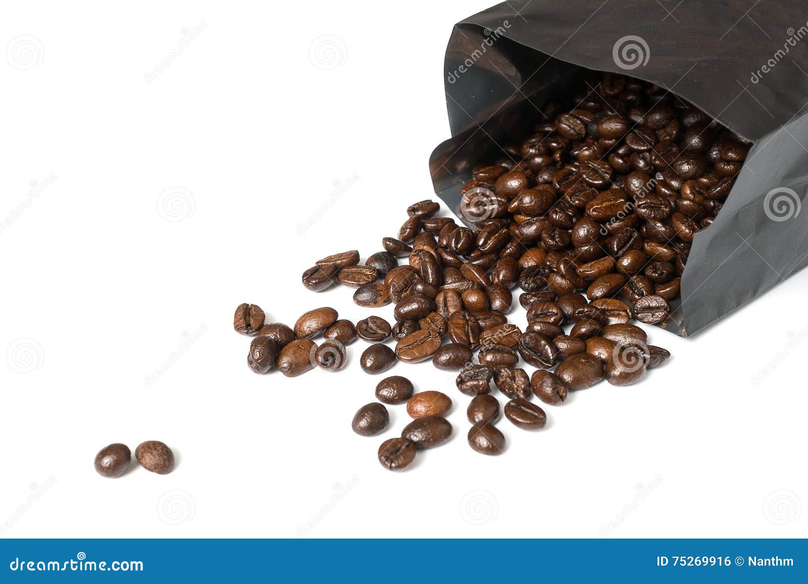 Coffee beans in black bag stock photo. Image of macro 75269916
