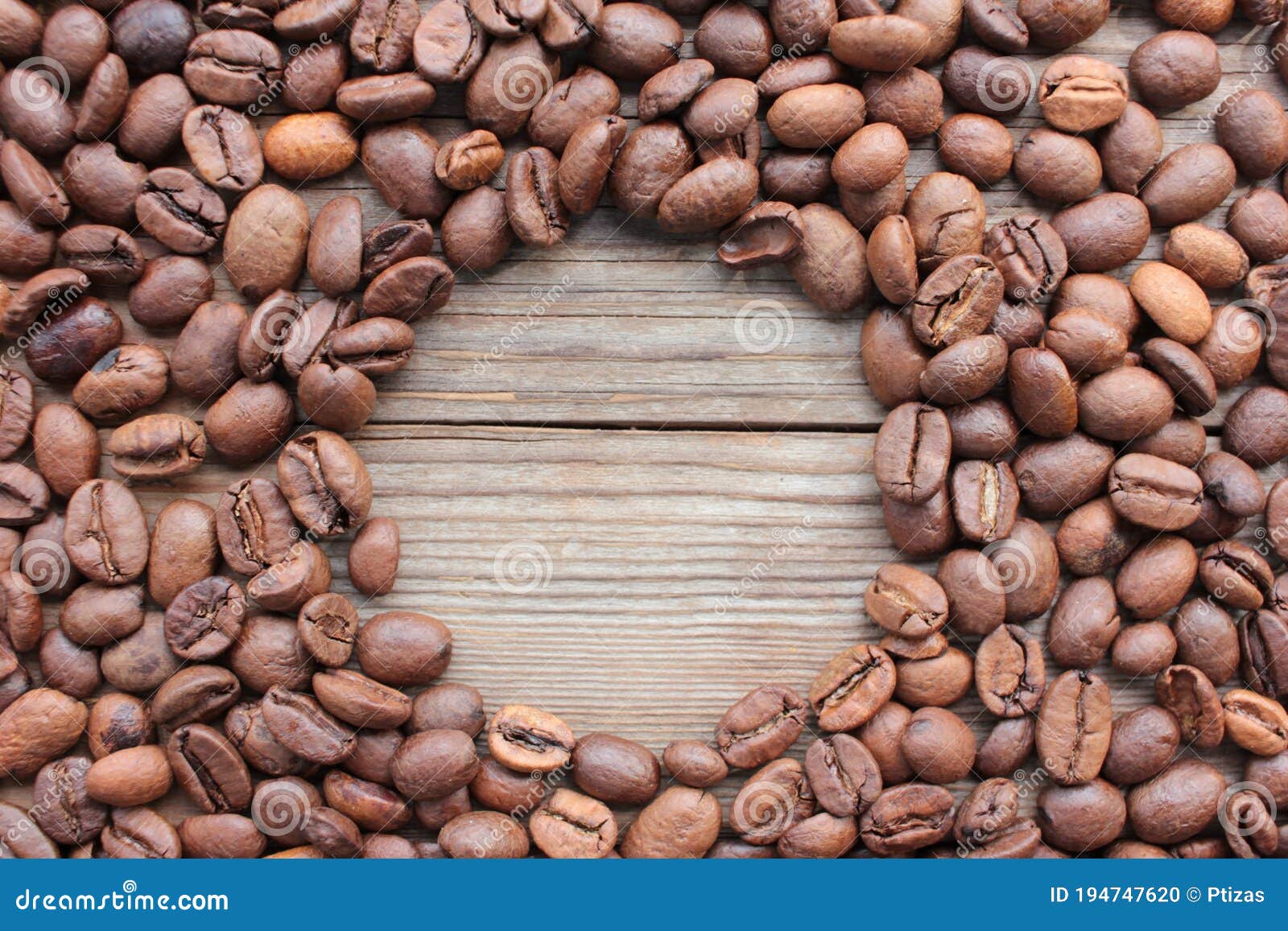 coffee beans frame on wooden background with copy space