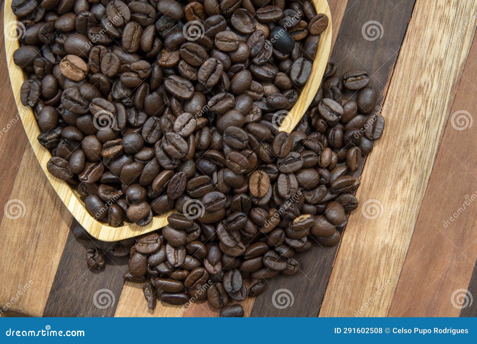 Coffee Beans in Heartshaped Tra,y Representing Love of Coffee Stock