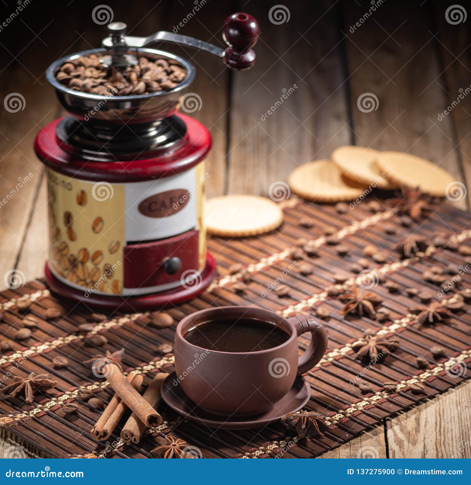 coffee beans in jute bag with coffee grinder