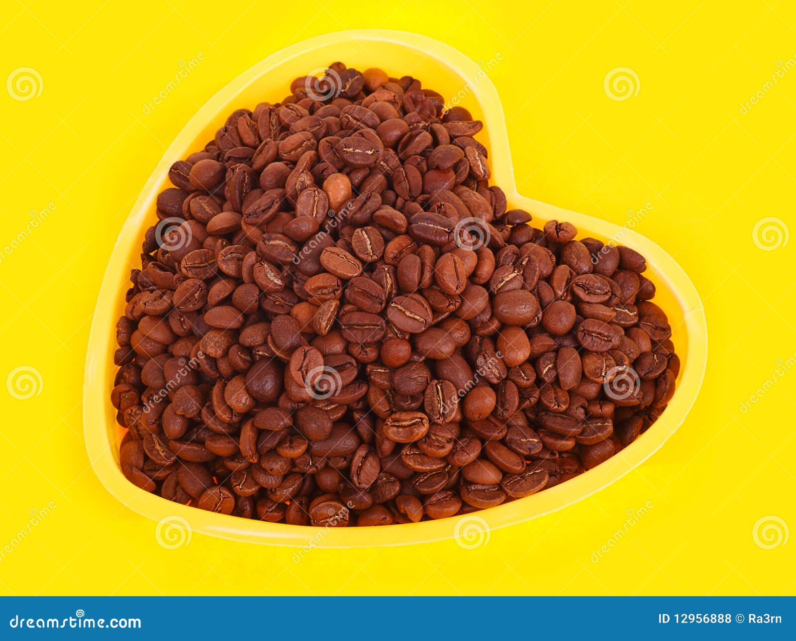 Coffee beans on a yellow stock photo. Image of form, caffeine 12956888