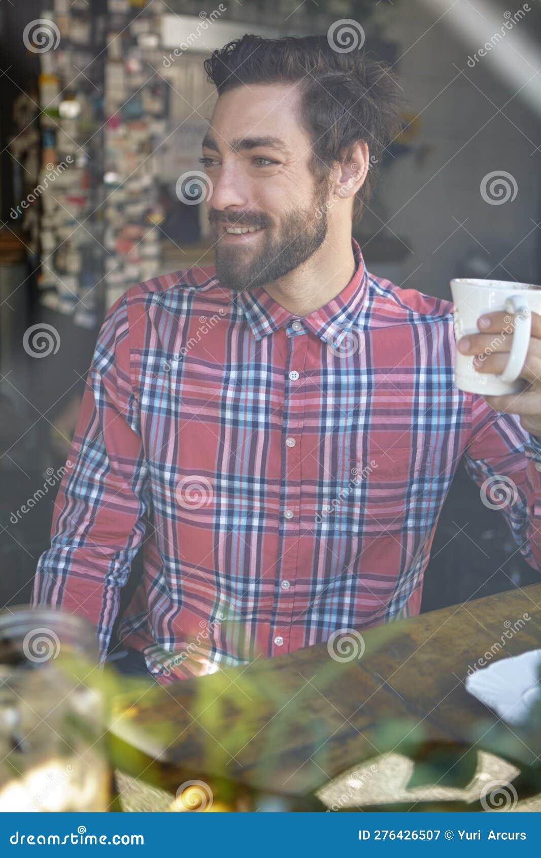 Coffee is Better Than No Coffee. a Young Man Drinking Coffee in a Cafe