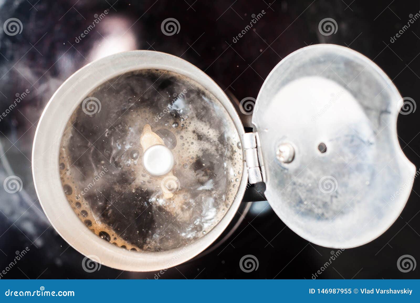 Coffee Boiling in a Coffee Maker on the Stove while Cooking with Brizgs