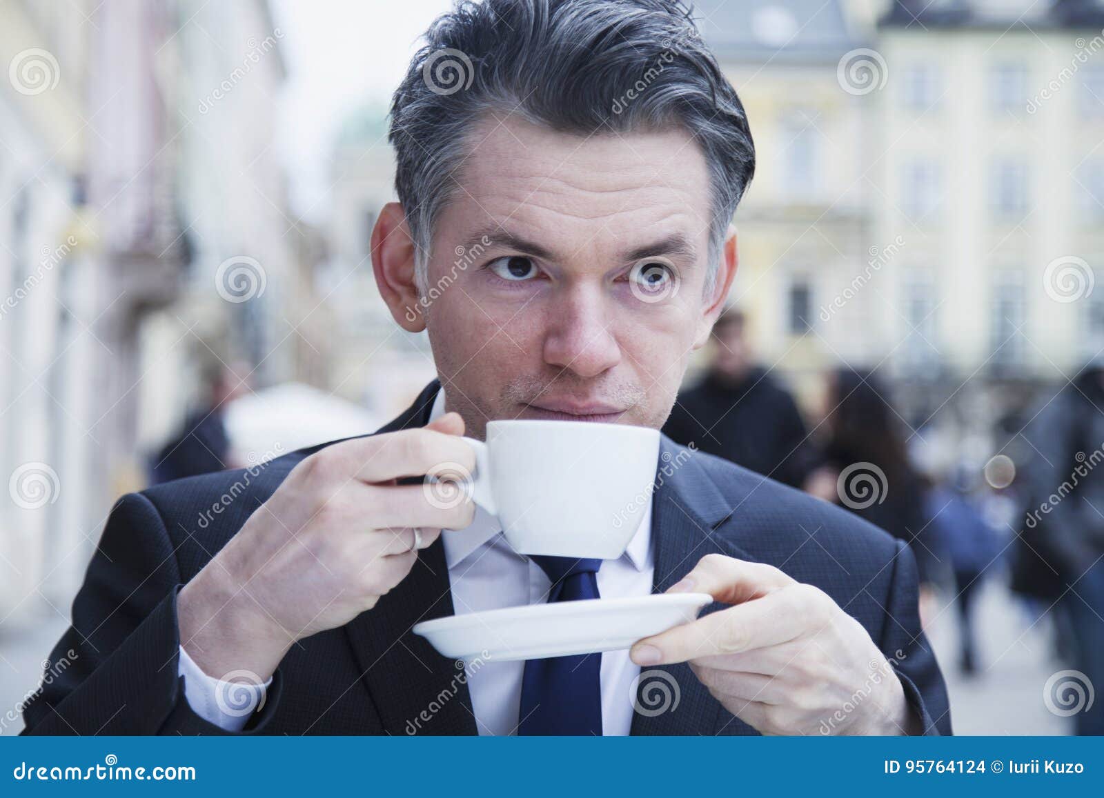 Coffee Break. Sucessful Businessman Enjoying in a Cup of Coffee Stock