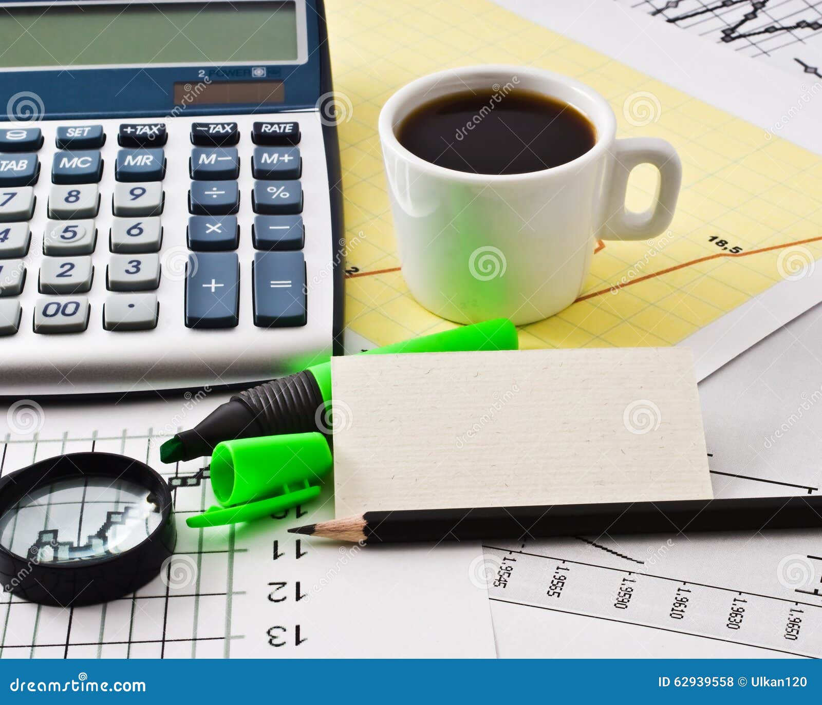 Coffee and Calculator on Paper Table with Diagram Stock Photo Image