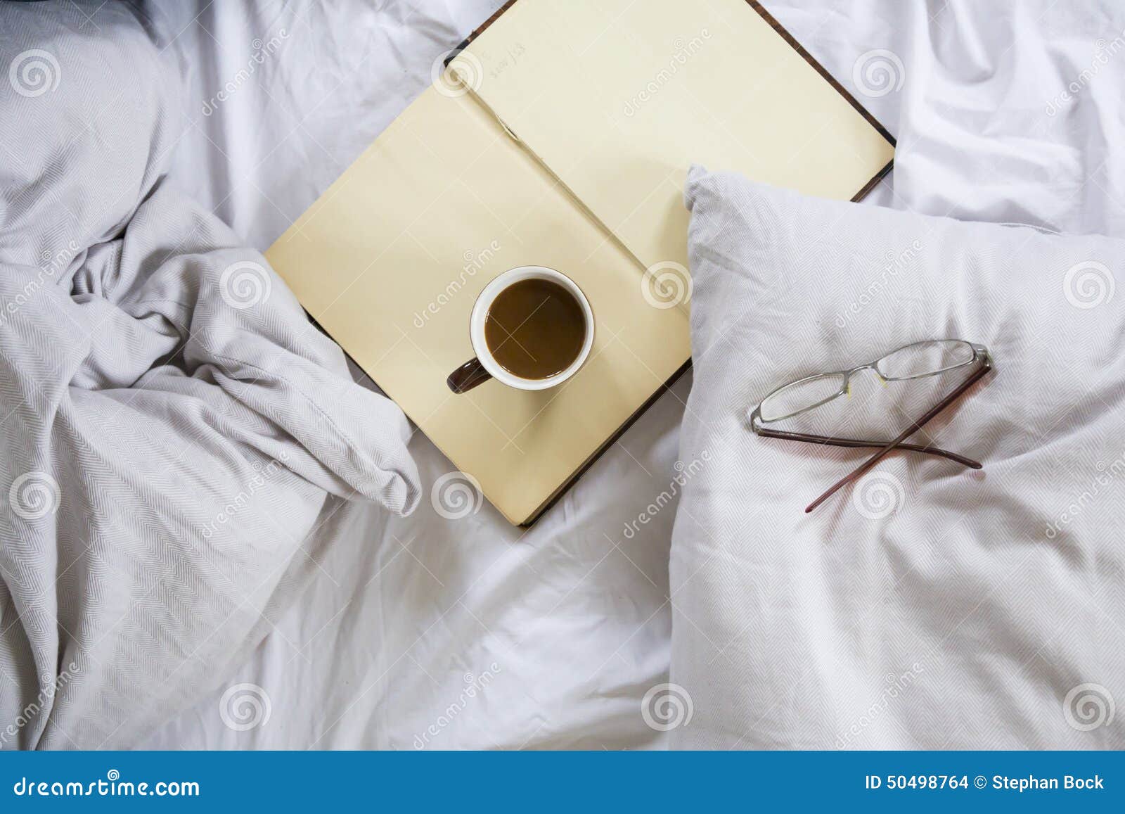 Coffee Cup, Book, Reading Glasses on Bed Stock Photo Image of