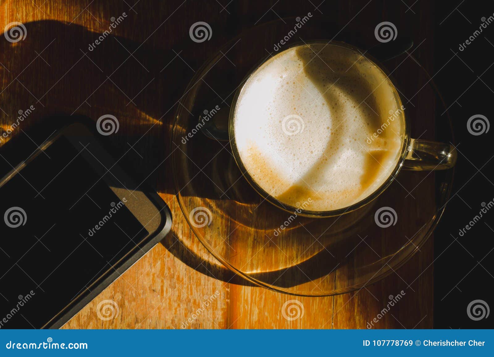 Coffee Cup with Cell Phone on Coffee Table Stock Image Image of
