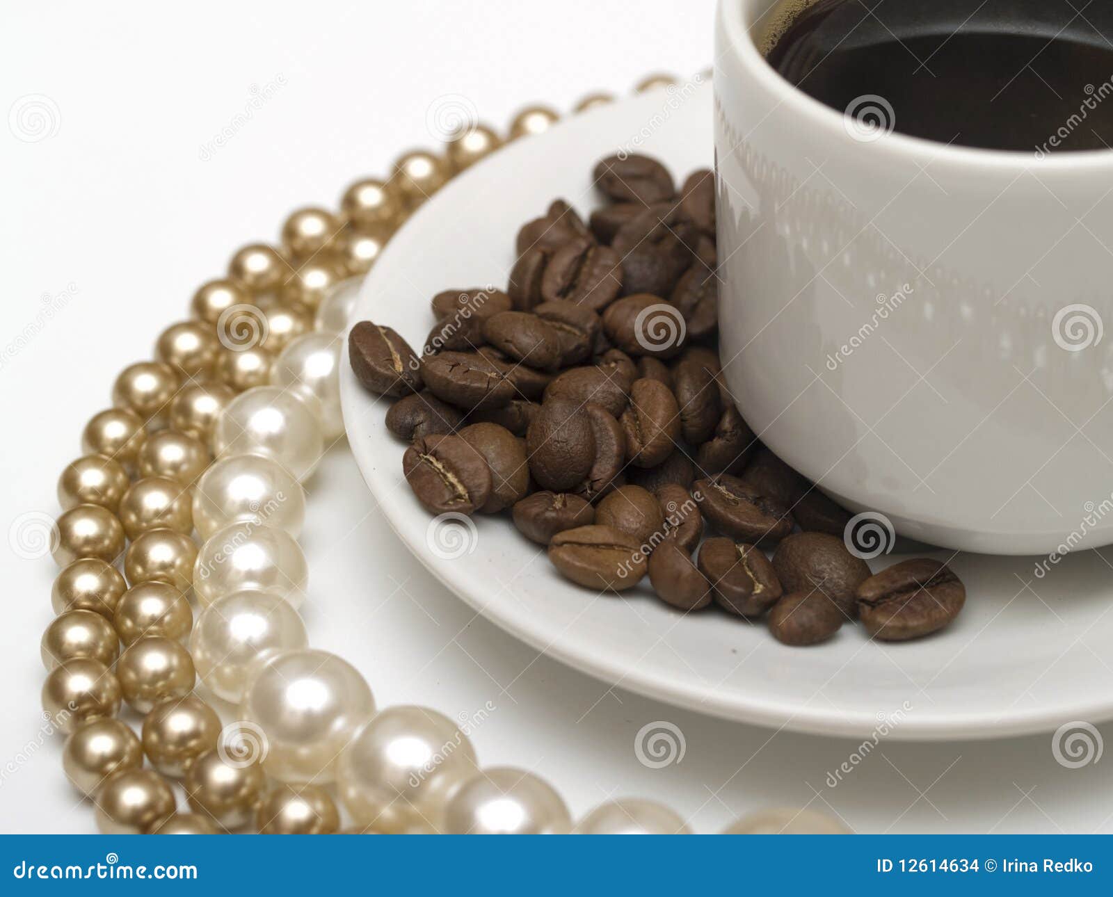 Coffee cup and pearl beads stock photo. Image of break 12614634