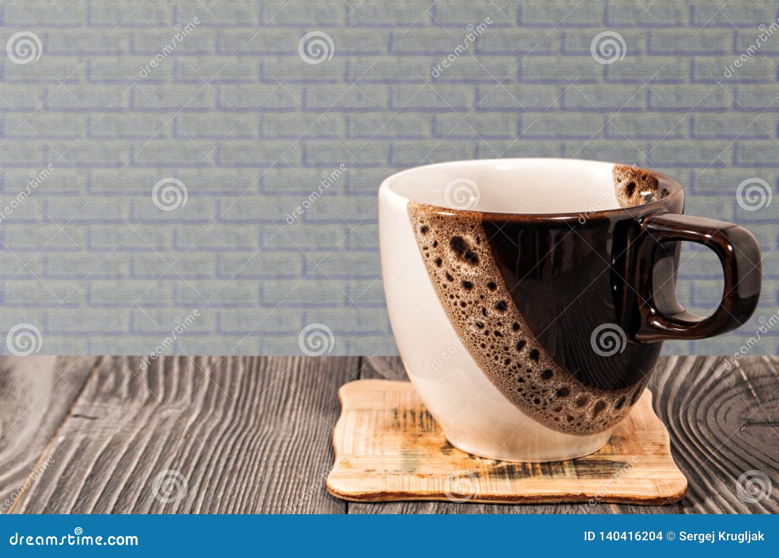 Coffee cup on the table stock photo. Image of block - 140416204