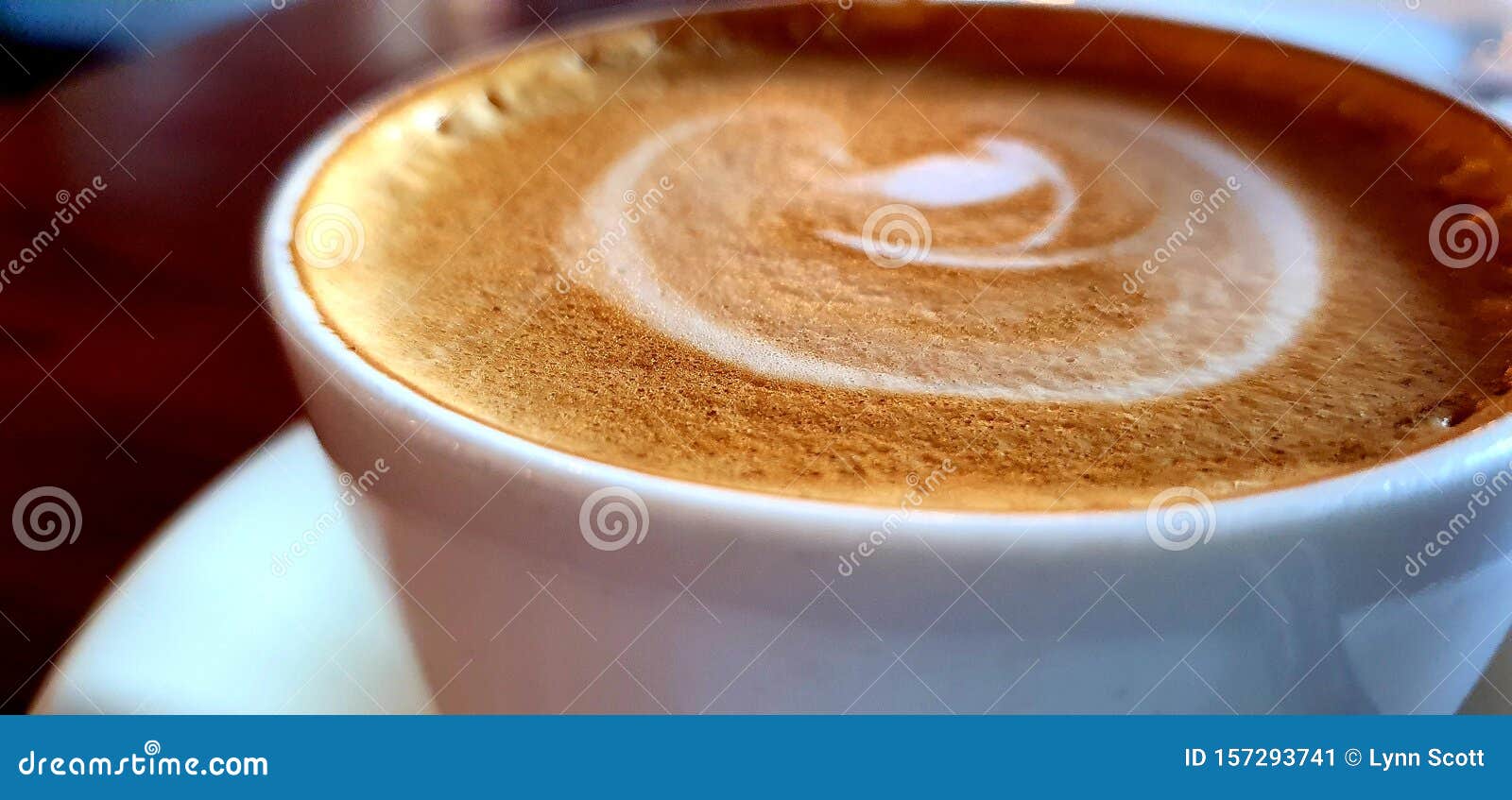 Coffee cup on table stock image. Image of coffeefroth - 157293741