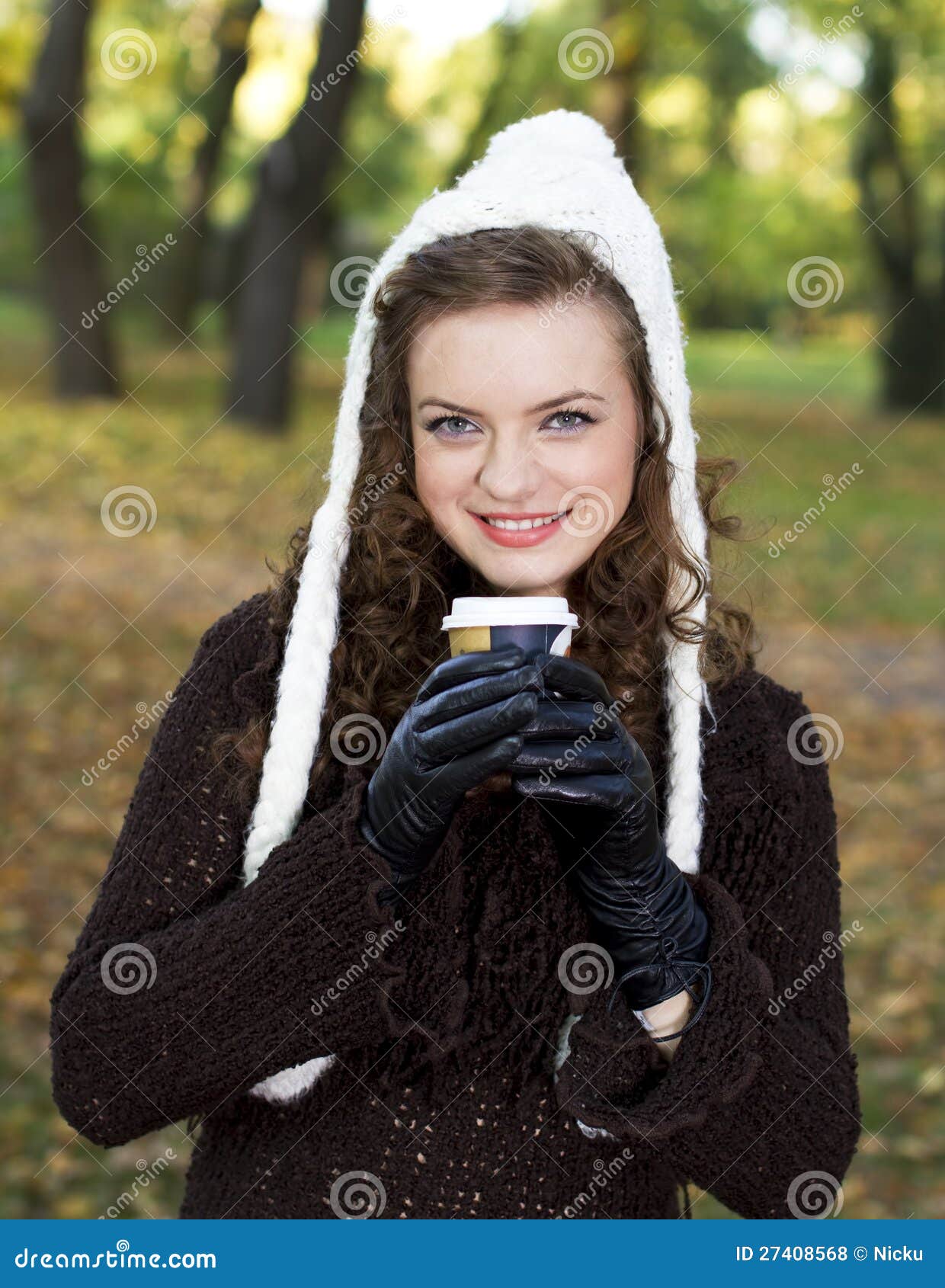 Coffee cup in the woods stock photo. Image of holding 27408568