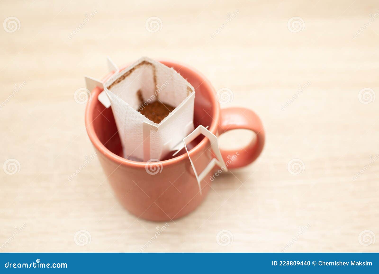 Coffee Drips in Cup. Alternative Brewing Coffee in Paper Filter Bags