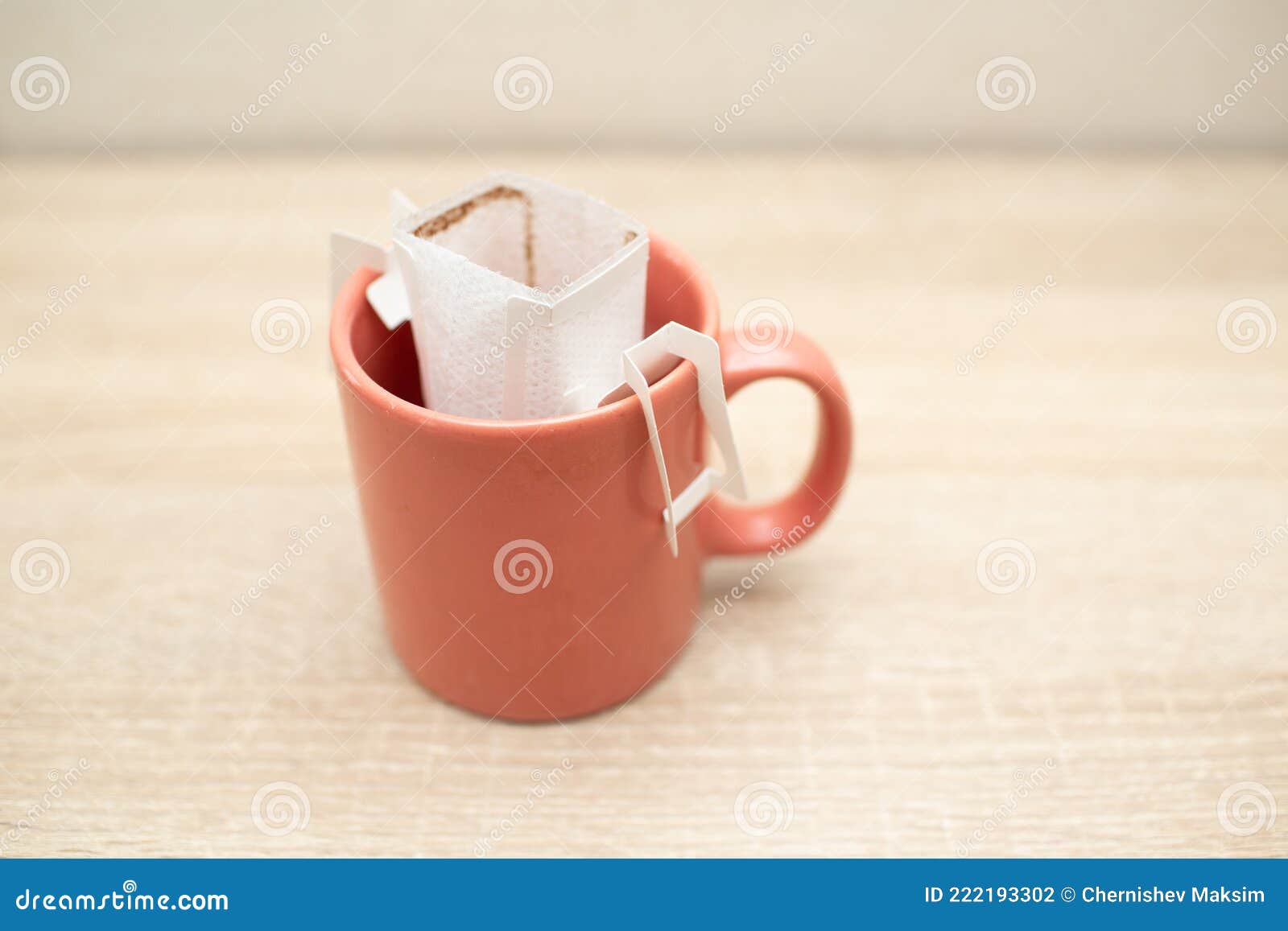 Coffee Drips in Cup. Alternative Brewing Coffee in Paper Filter Bags