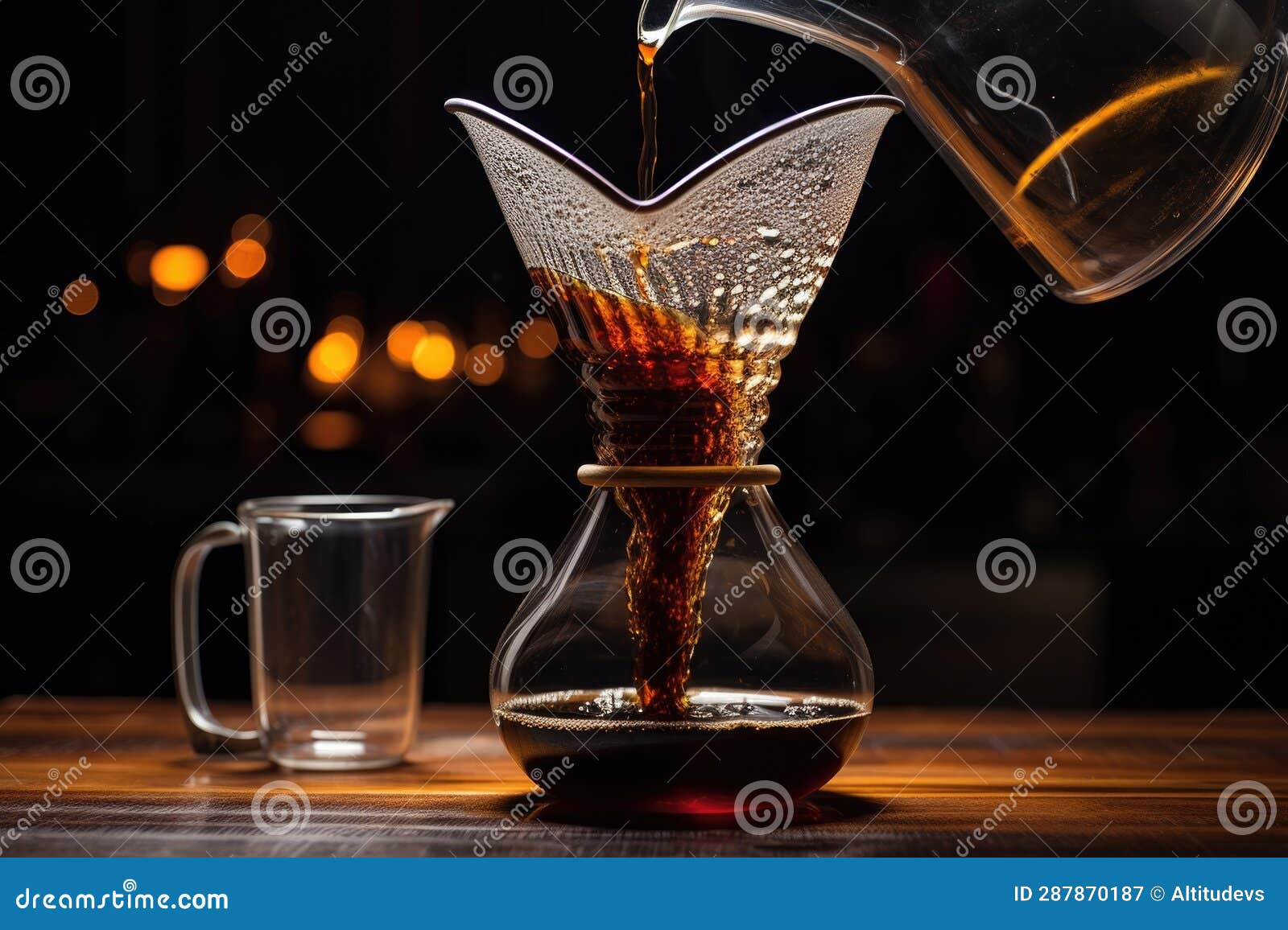 Coffee Drips into a Glass Carafe from a Pourover Stock Illustration