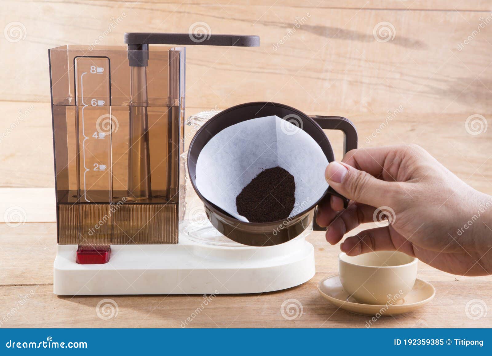 Old Coffee Machine and Poured into a Cup, Decorated with Roasted Coffee