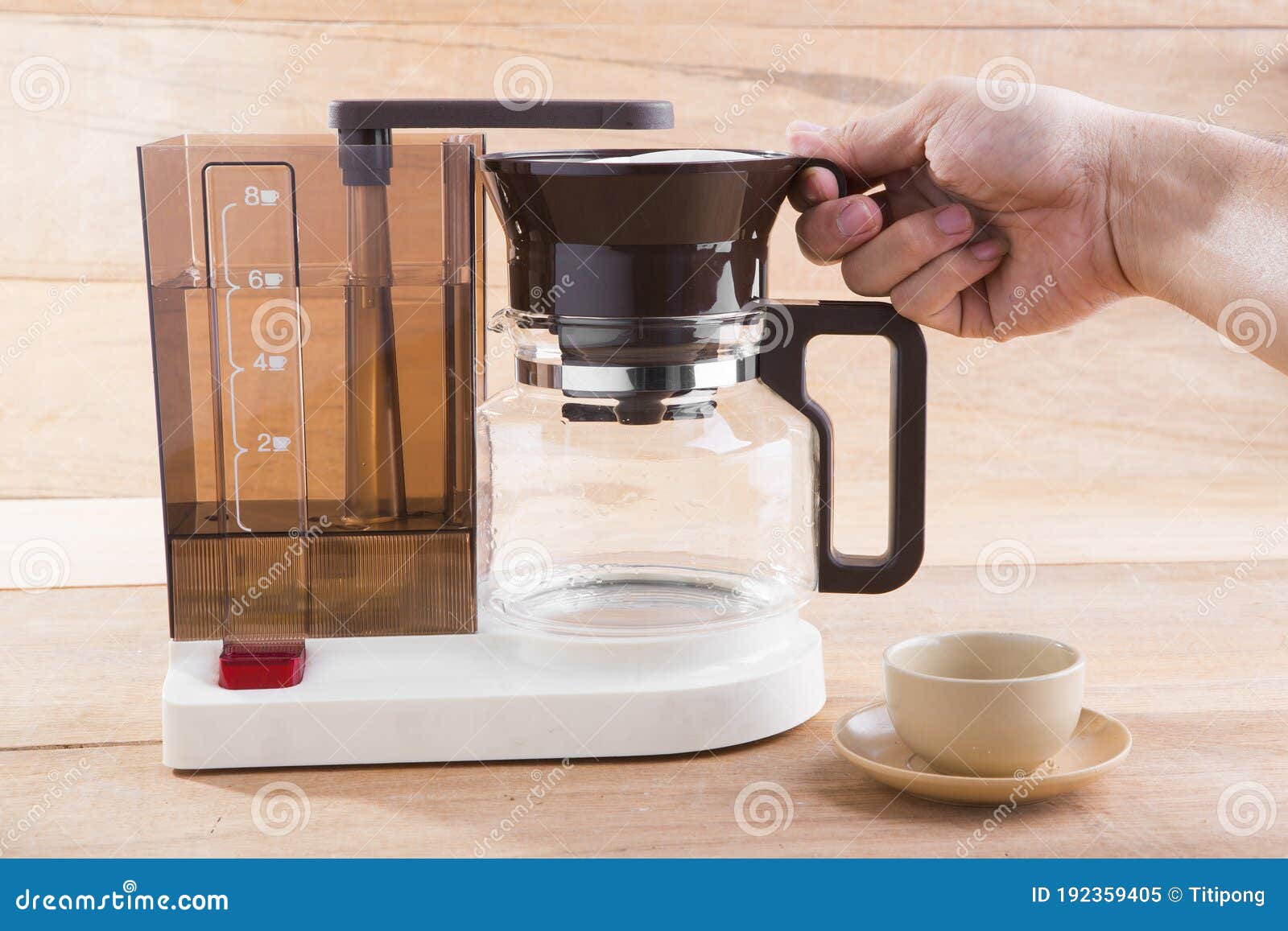 Old Coffee Machine and Poured into a Cup, Decorated with Roasted Coffee