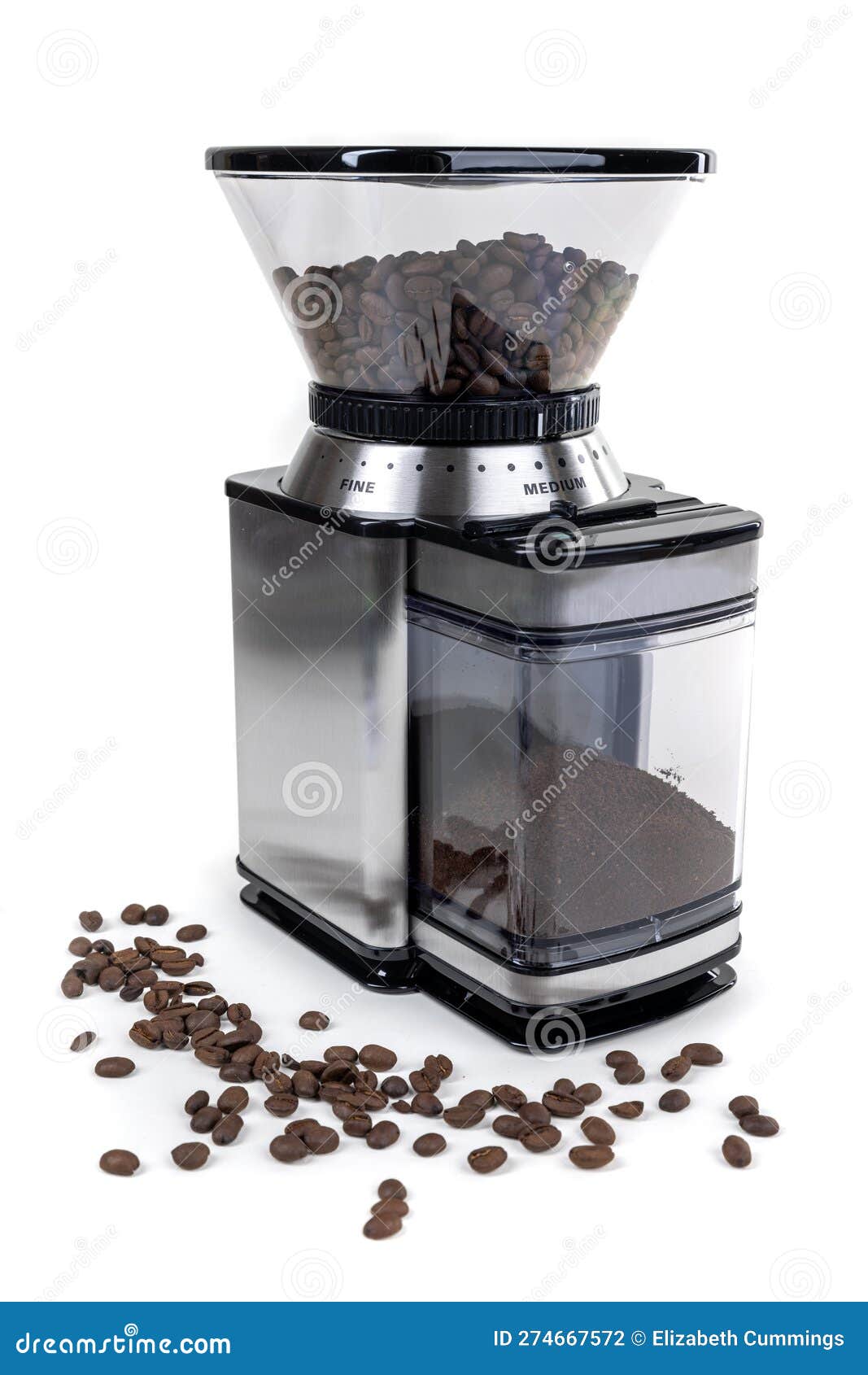 Coffee Grinder with Espresso Roast Beans Over a White Background Stock