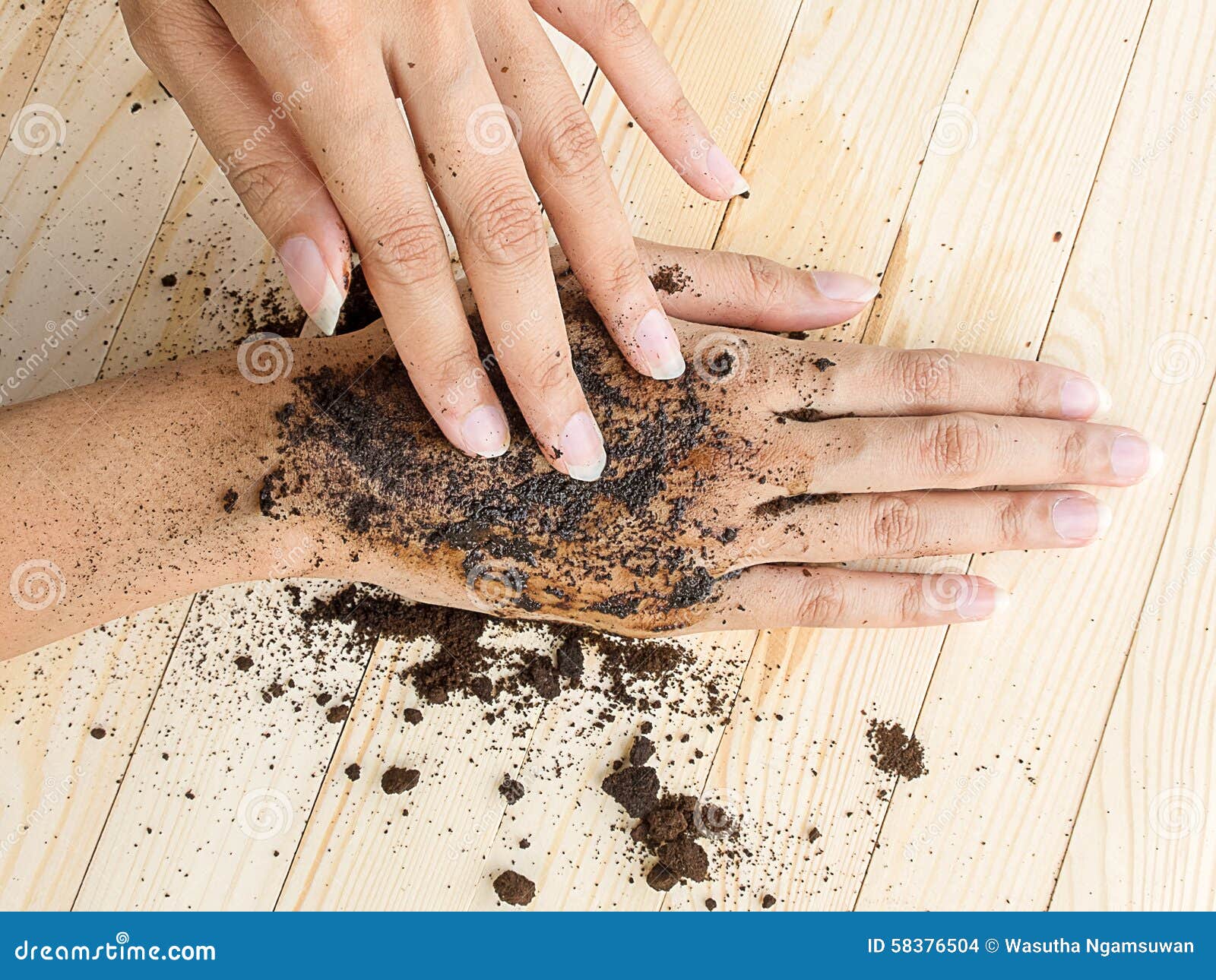 Coffee Hand Scrub with Ground Coffee on Wooden Background Stock Photo