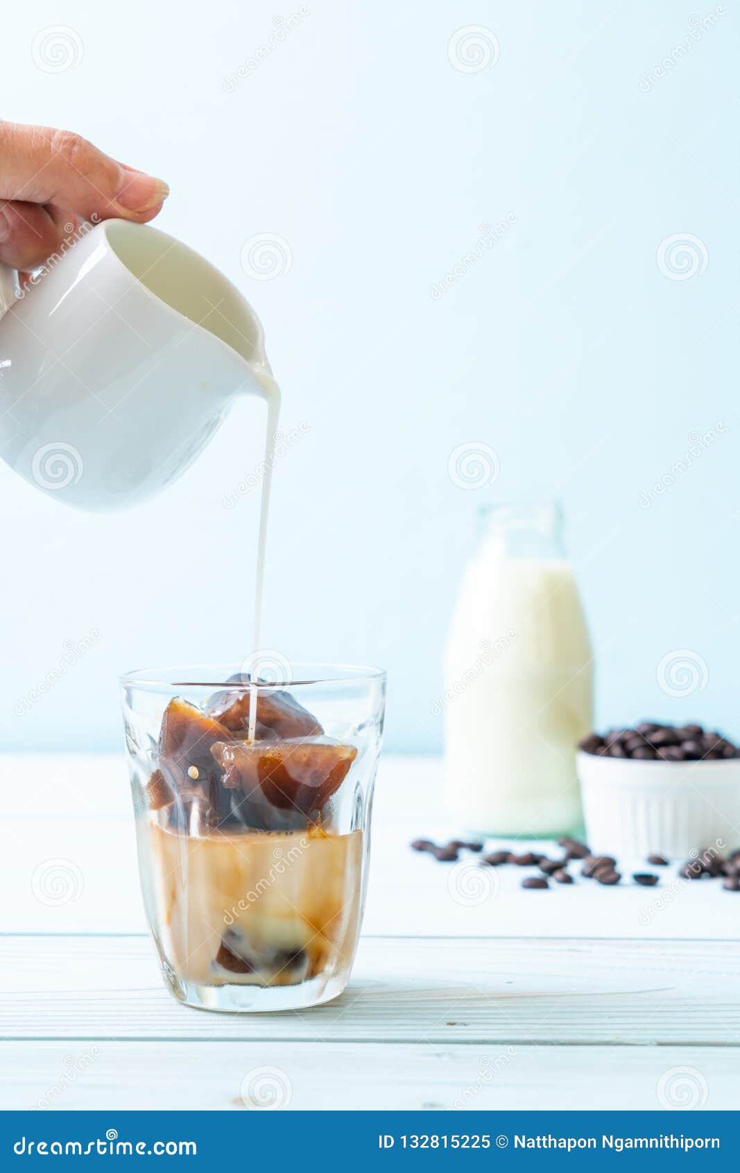 Coffee ice cubes with milk stock image. Image of coffee 132815225