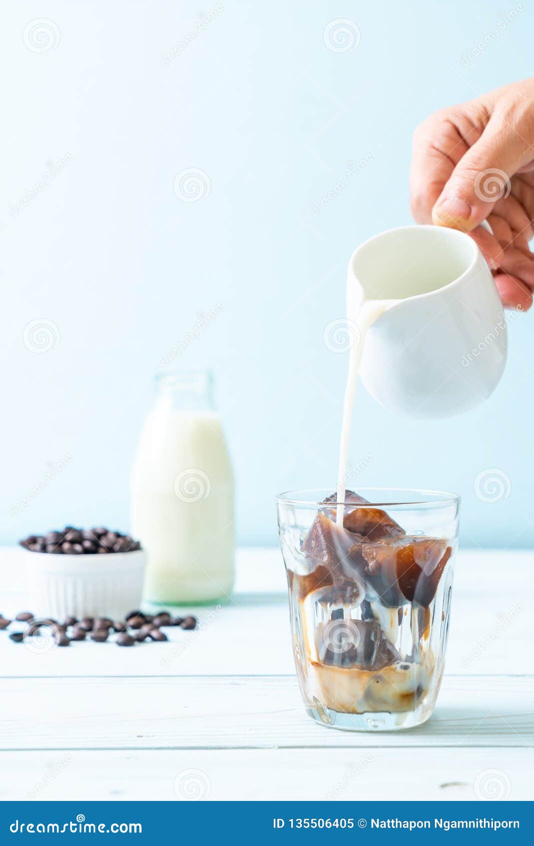 Coffee ice cubes with milk stock image. Image of summer 135506405