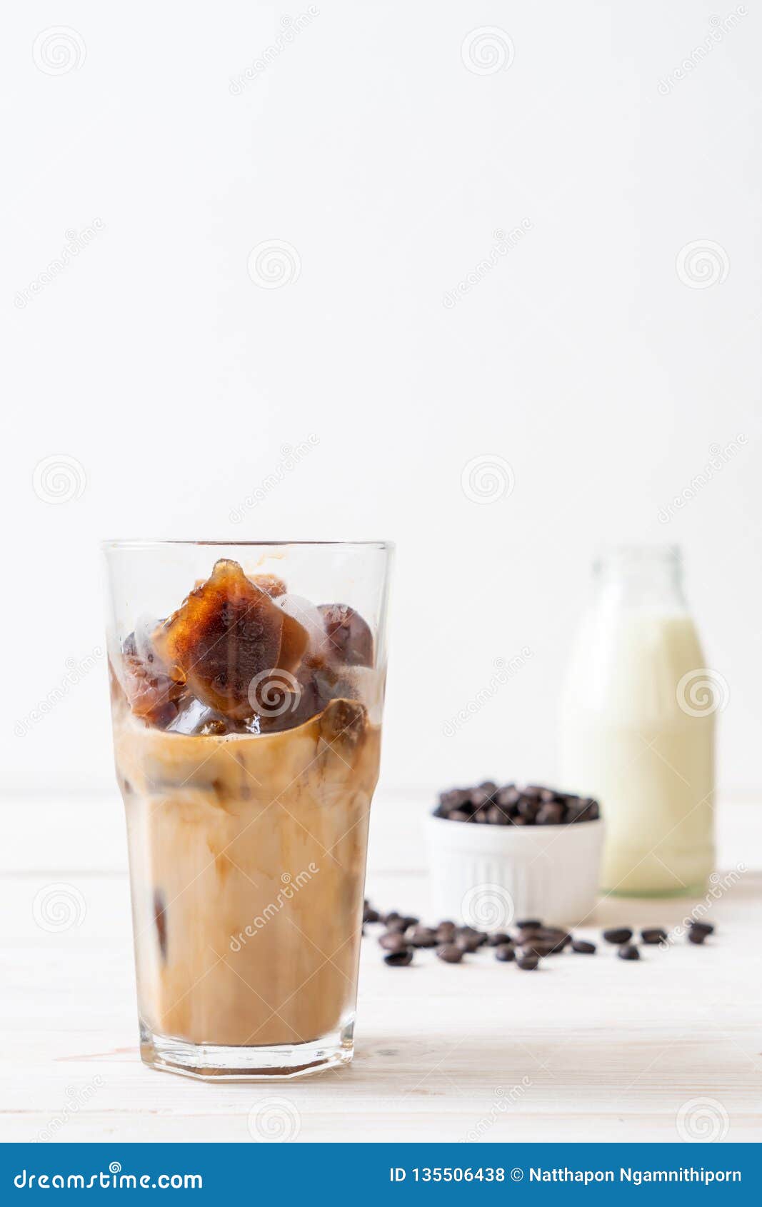 Coffee ice cubes with milk stock photo. Image of coffee 135506438