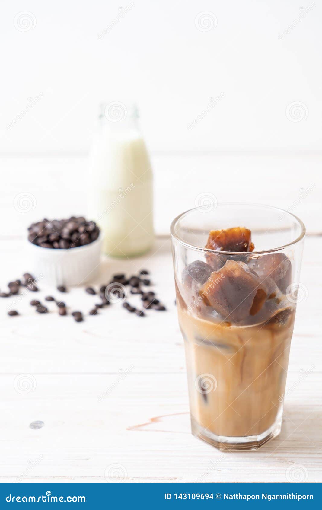 Coffee ice cubes with milk stock photo. Image of dessert 143109694