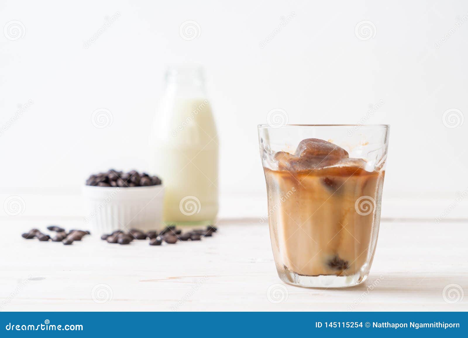 Coffee ice cubes with milk stock photo. Image of morning 145115254