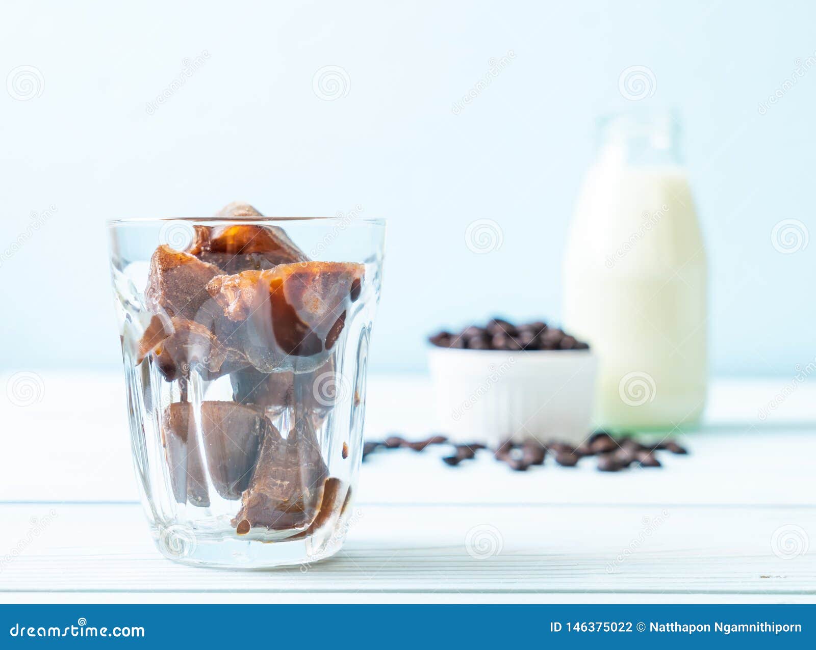 Coffee ice cubes with milk stock photo. Image of coffee 146375022