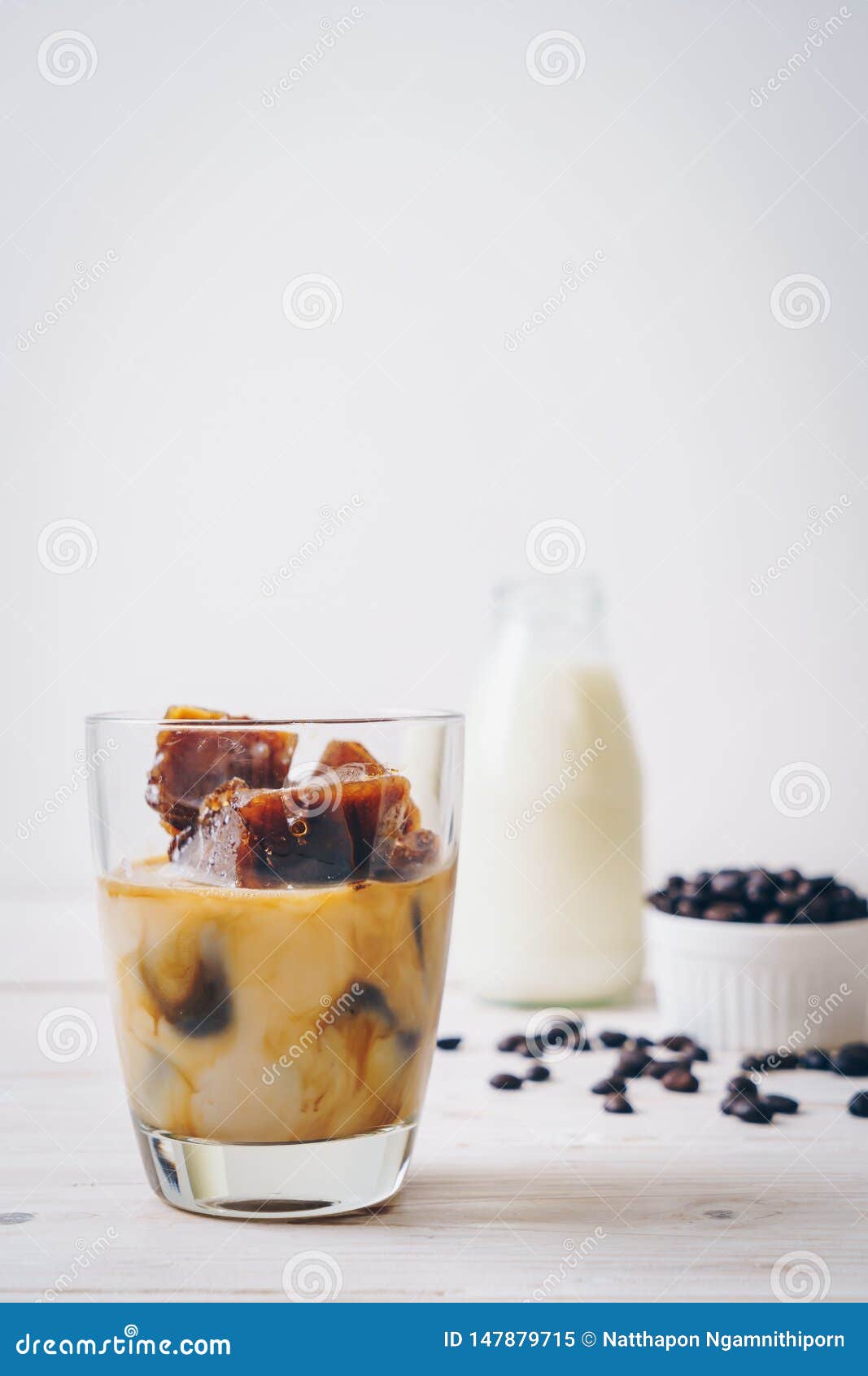 Coffee ice cubes with milk stock image. Image of refreshment 147879715