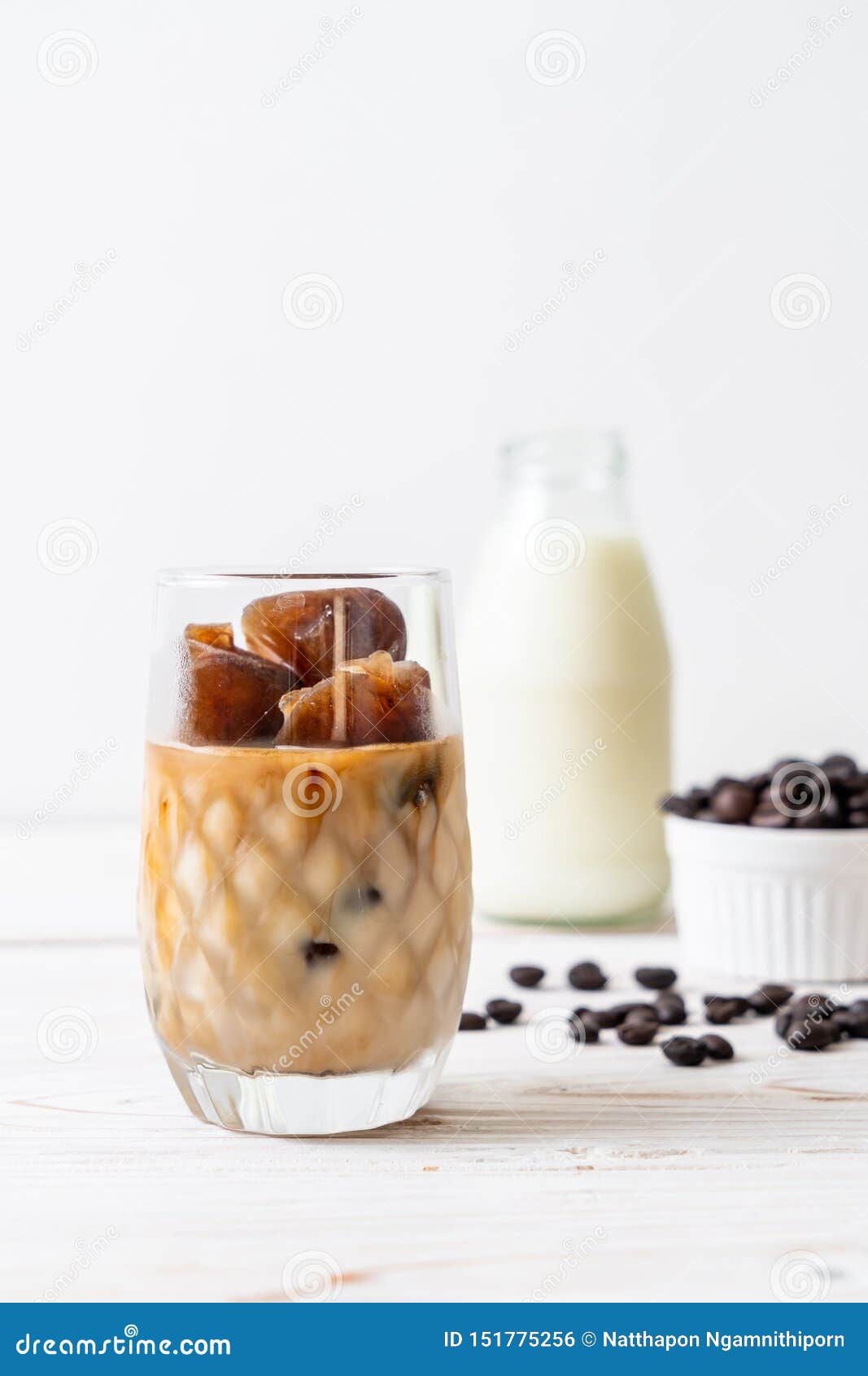 Coffee ice cubes with milk stock photo. Image of glass 151775256
