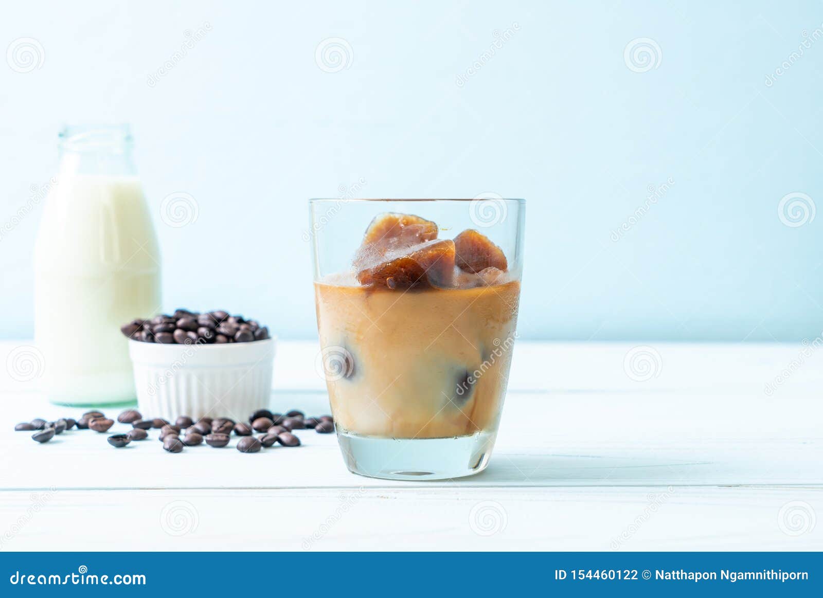 Coffee ice cubes with milk stock photo. Image of delicious 154460122