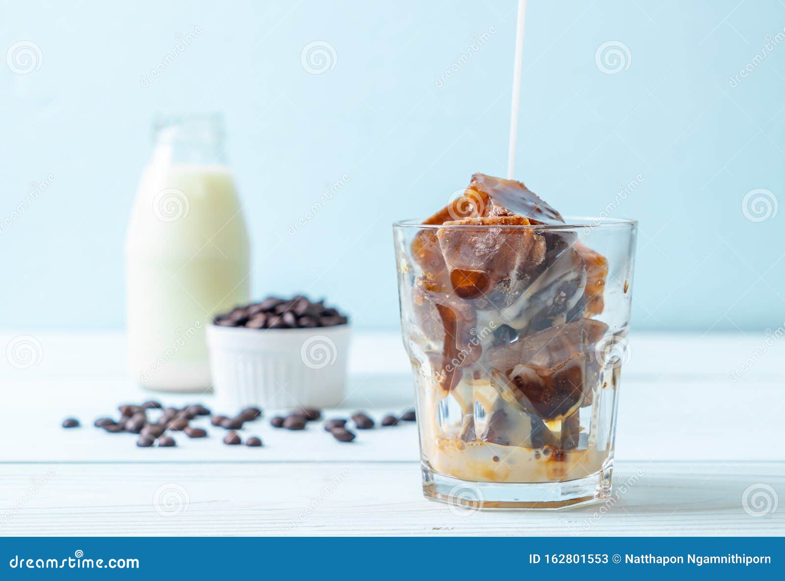 Coffee ice cubes with milk stock image. Image of white 162801553