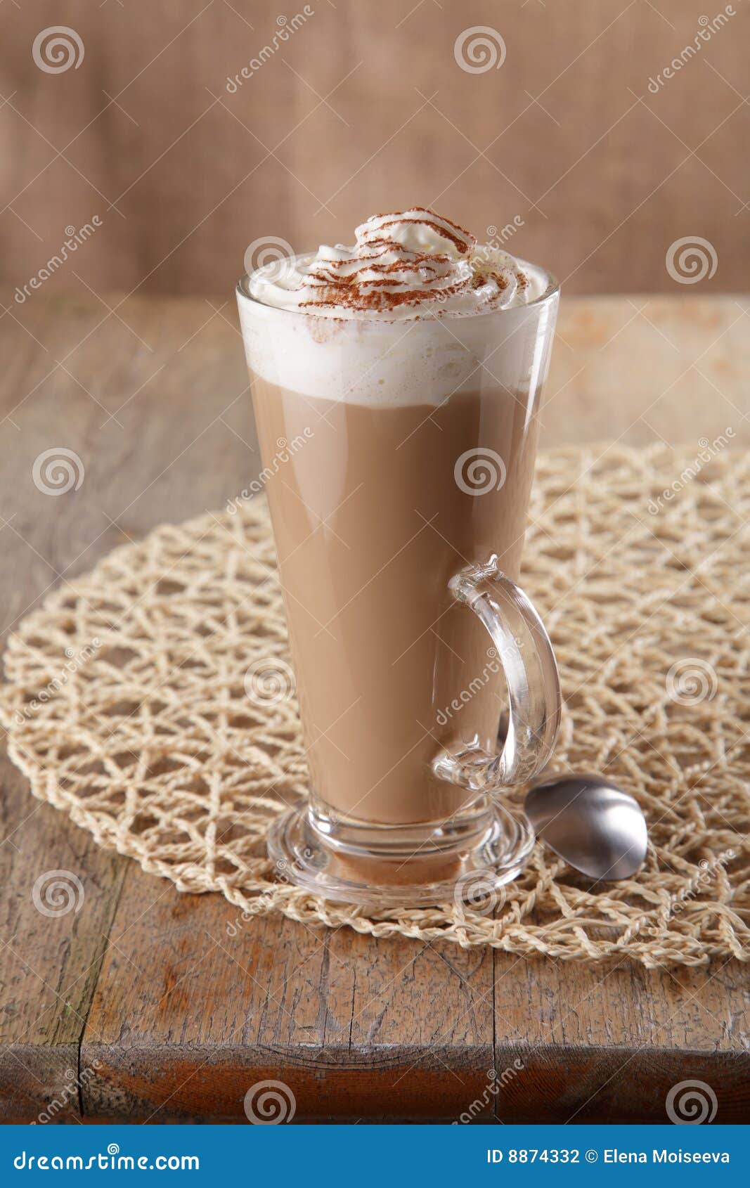 coffee latte macchiato with cream in glass