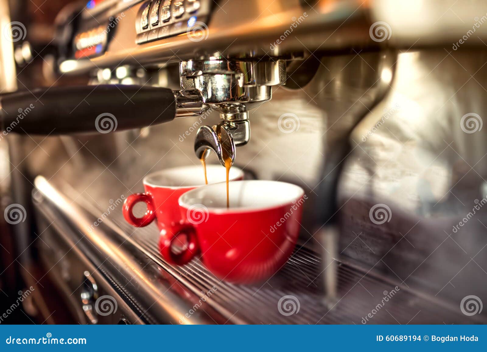 coffee machine preparing fresh coffee and pouring into red cups at restaurant, bar or pub.