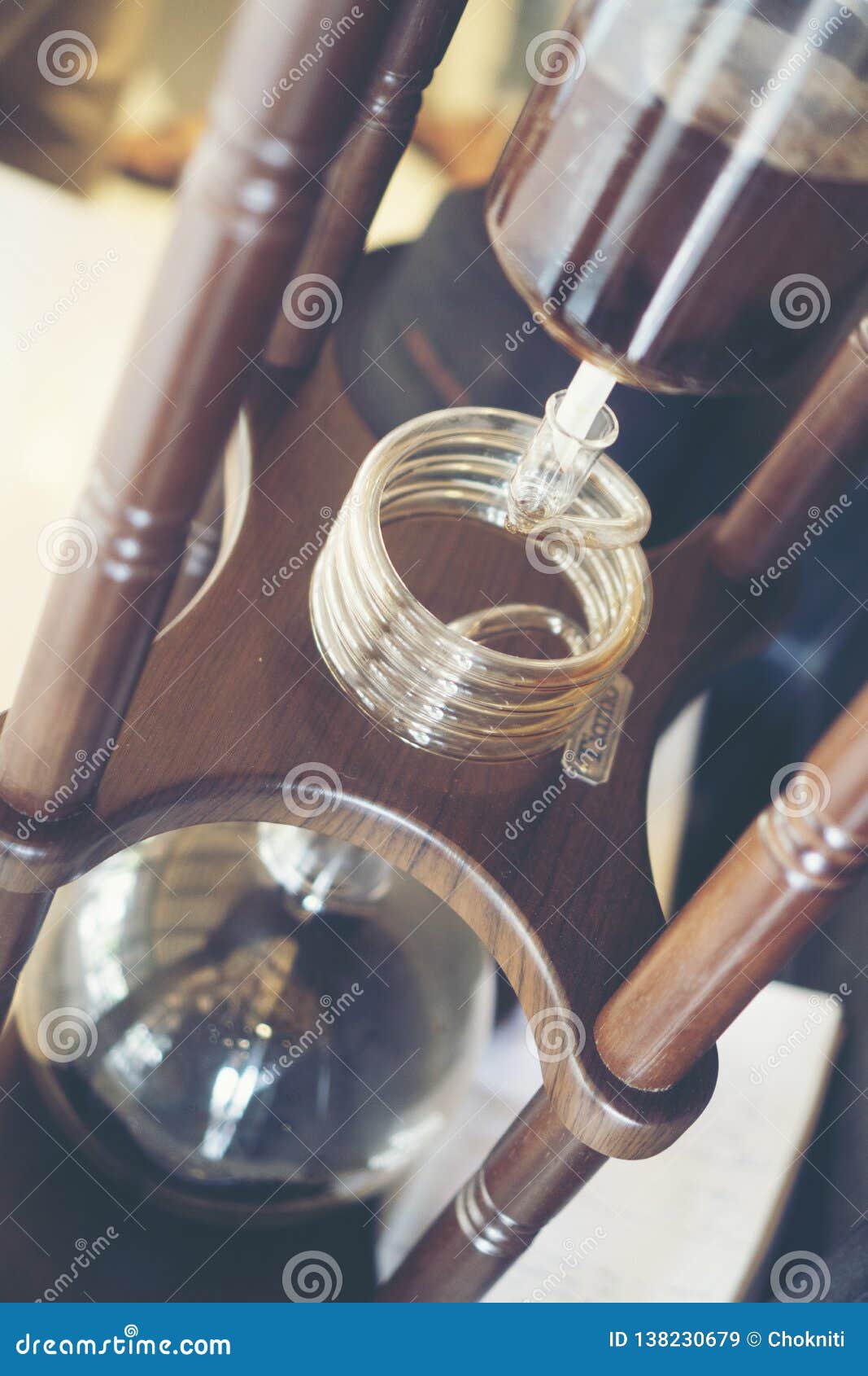 Drip Brewing Coffee With Smoke And Coffee Grinder On Wooden Bar In