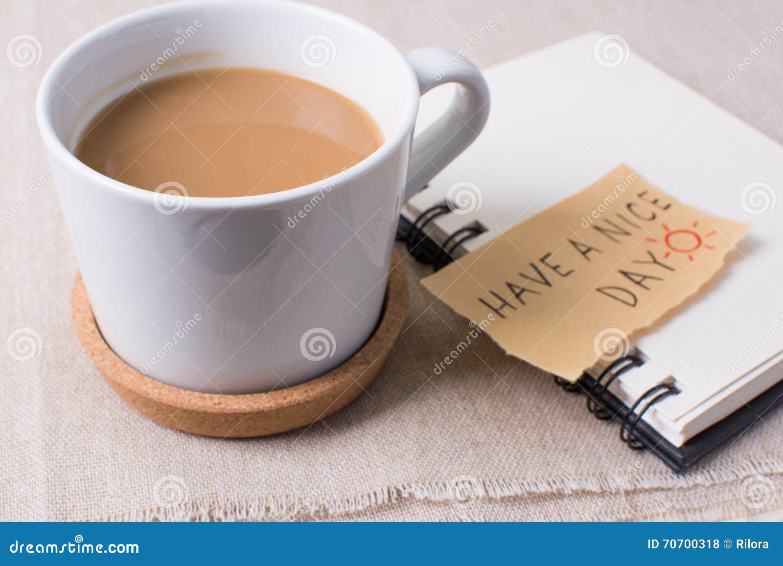 Coffee Mug with Notebook and Message, Have a Nice Day Concept Stock
