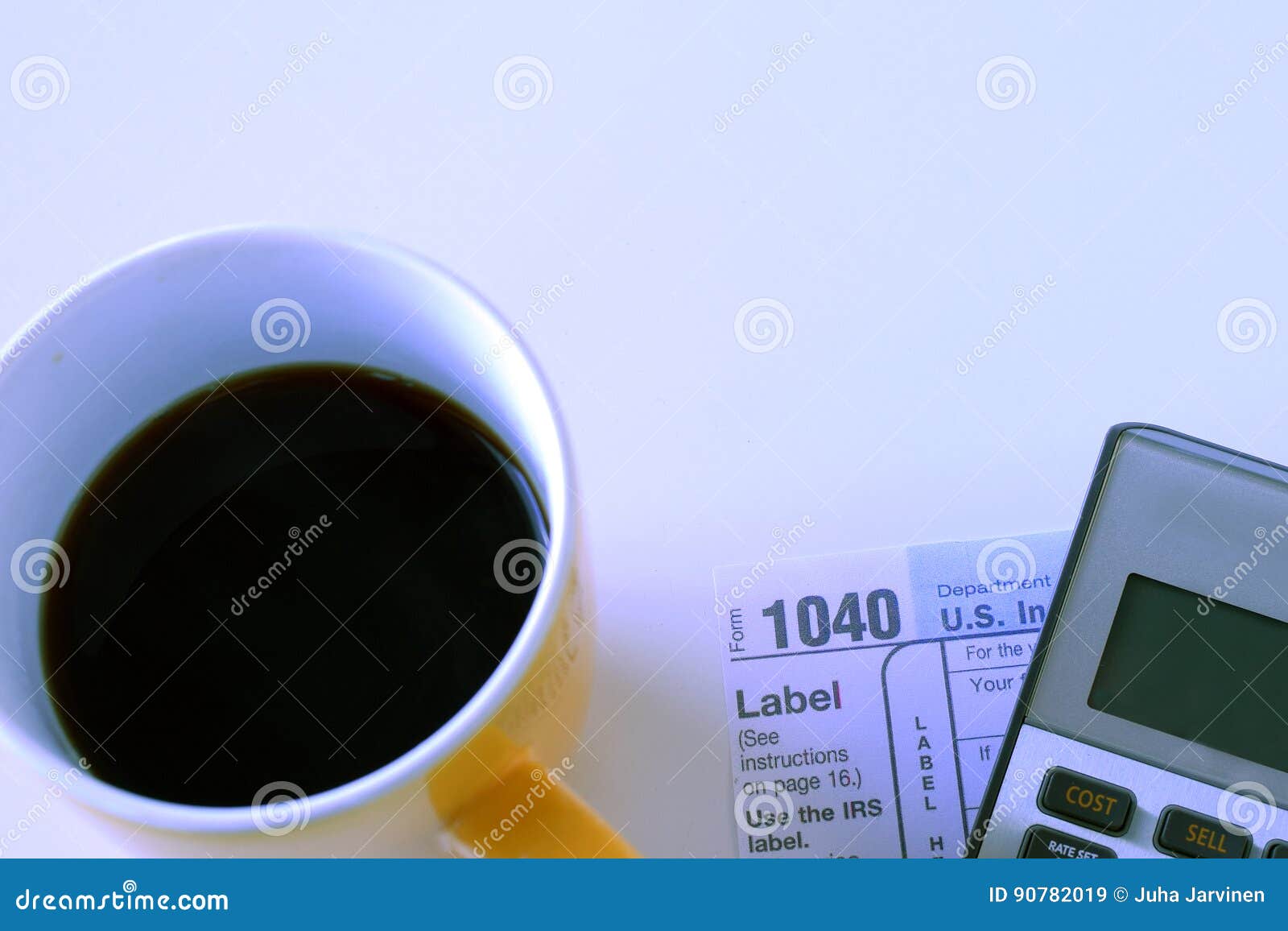 Coffee Mug, USA Tax Form 1040 and Calculator. Editorial Stock Image