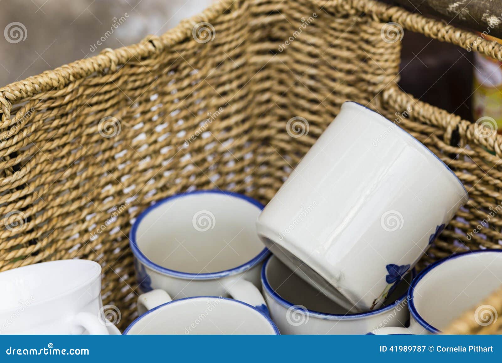 Coffee mugs in a basket stock image. Image of horizontal 41989787