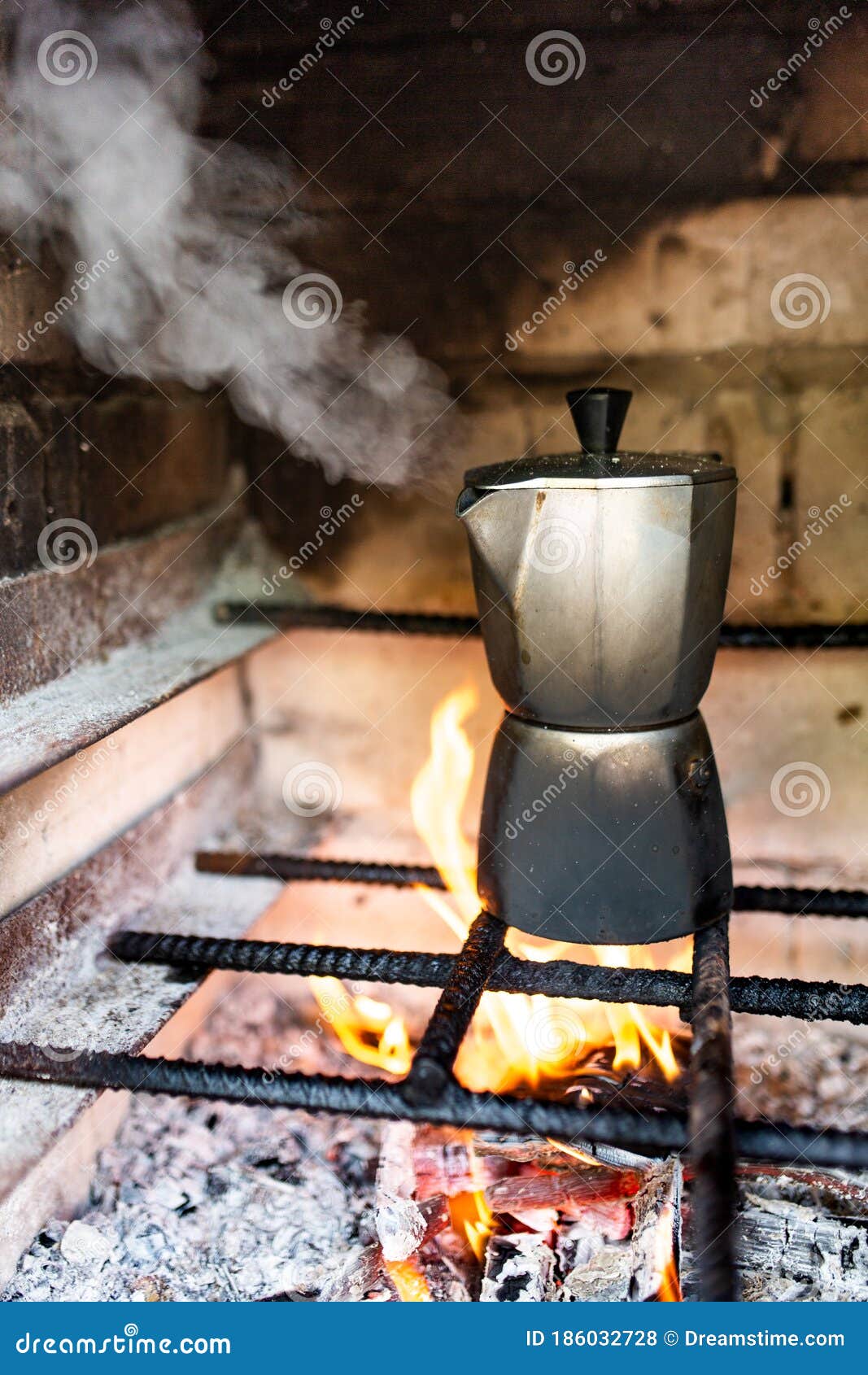 Coffee pot on fire stock photo. Image of steam, fire 186032728