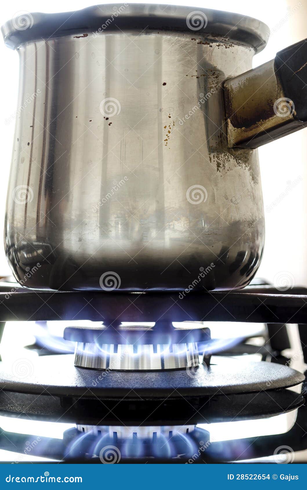 Coffee pot on a gas stove stock photo. Image of fire 28522654