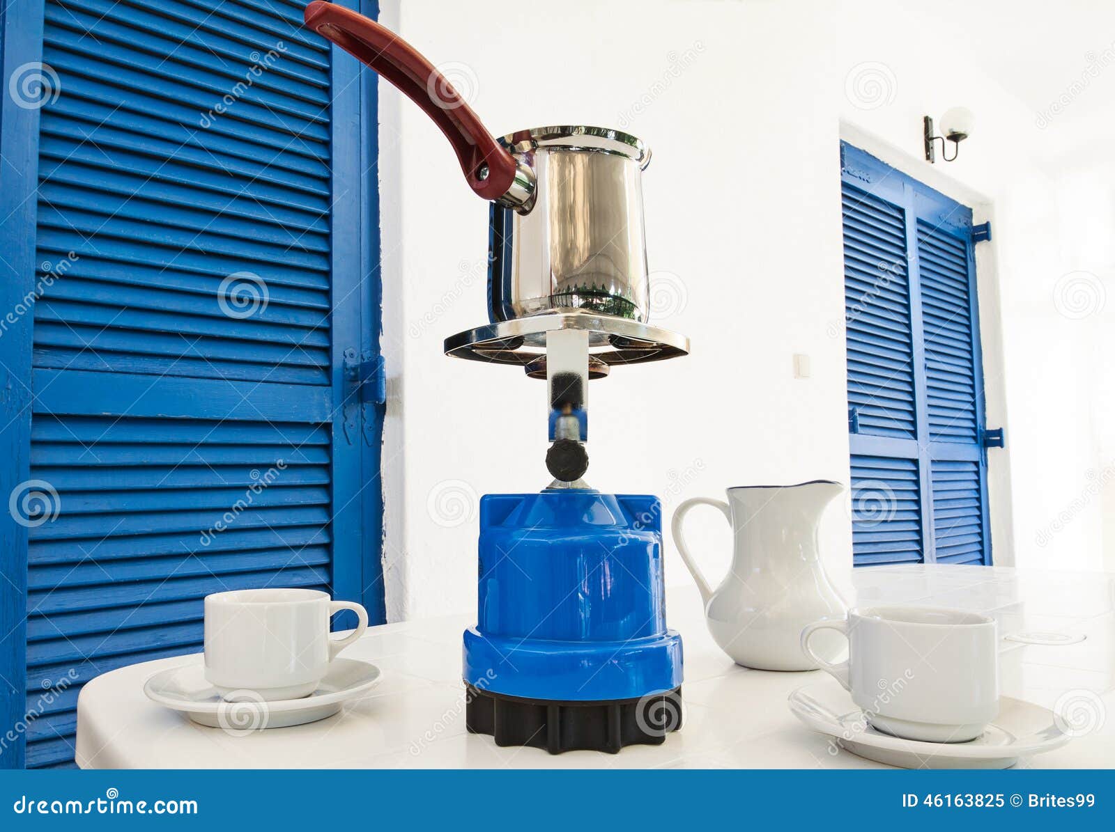 Coffee Pot on a Primus Stove with Cups on Summer Veranda. Stock Image