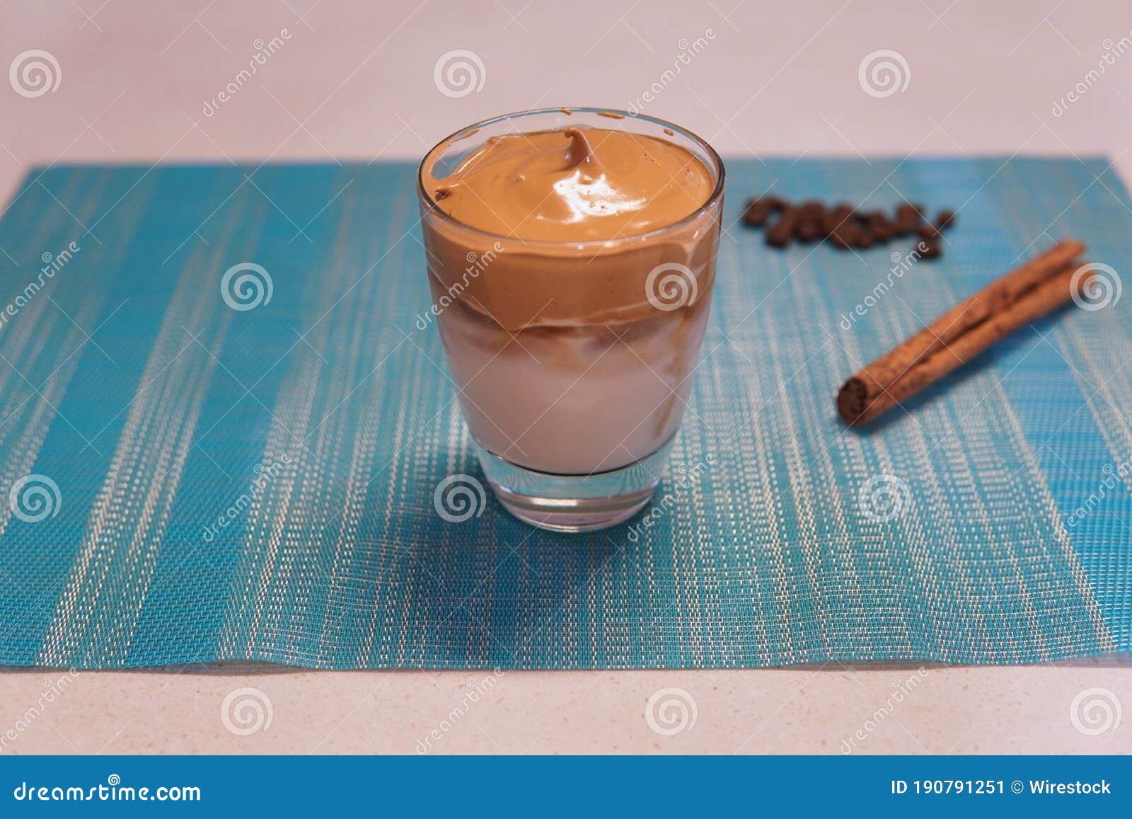 Coffee Trend Dalgona Coffee, Whipped Instant Coffee on Blue Background, Copy Space Stock Image
