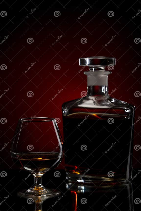Cognac glass and bottle stock image. Image of leather 17014157