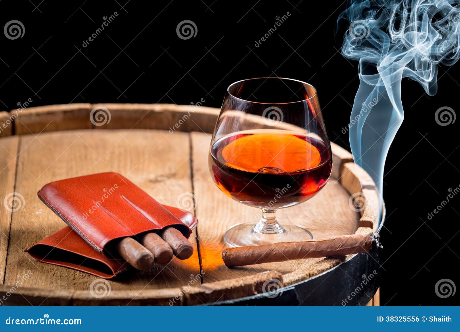 Cognac in a Glass on Wooden Barrel Stock Photo - Image of achievement