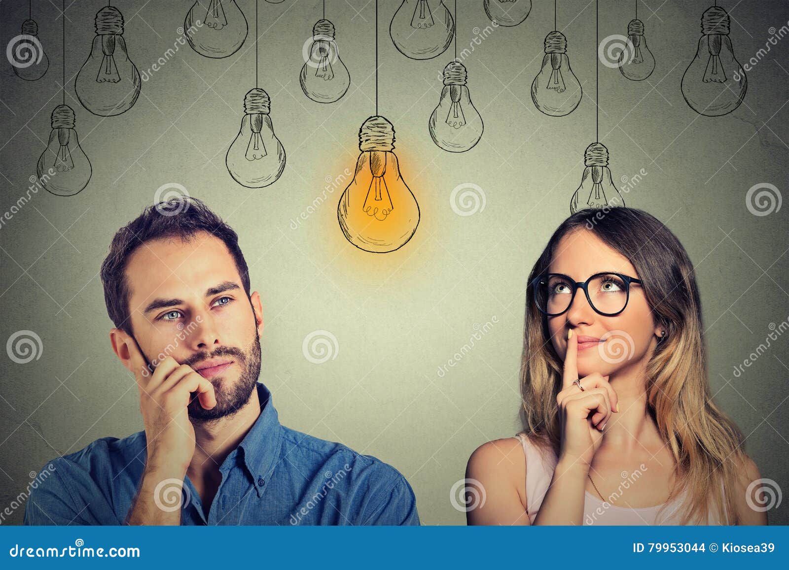 cognitive skills male vs female. man and woman looking at light bulb