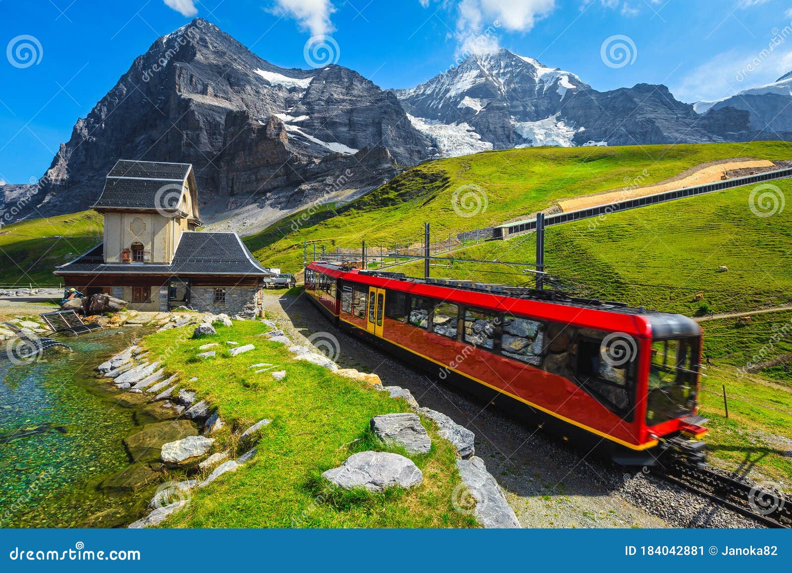 cogwheel tourist train coming down from the mountain, jungfraujoch, switzerland