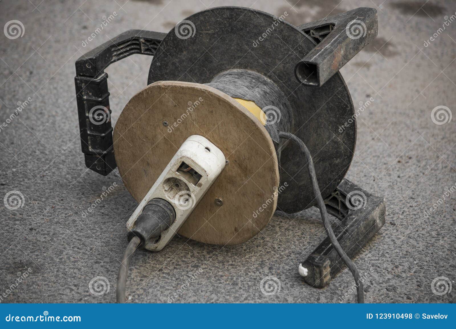 Coil with Wires and Socket on the Asphalt Stock Photo Image of