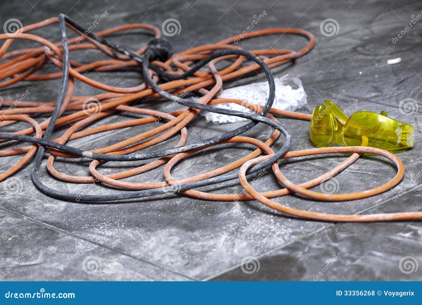 coils-electrical-cable-lying-floor-workplace-power-cords-tangled-mess-33356268.jpg